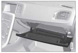 Le manuel de conduite et d'entretien et les cartes routières par exemple peuvent être rangès